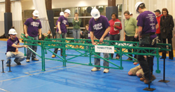 Manhattan College students assembling bridge at competition