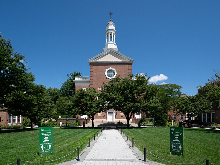 Campus image of the quad and smith auditorium on a sunny day